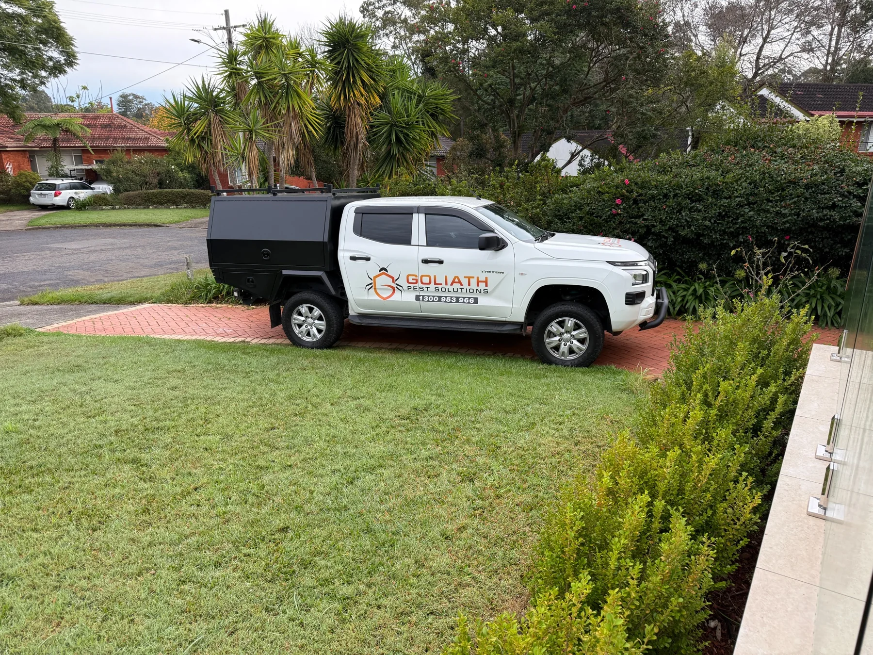 Goliath Pest Solutions truck parked on site