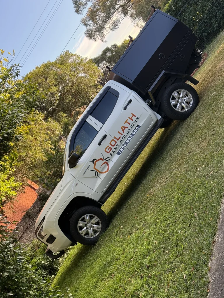 Goliath Pest Solutions pest-control vehicle attending a residential property