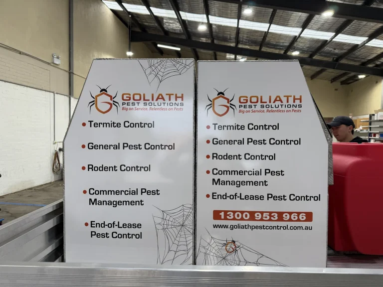 Goliath Pest Solutions service signage displaying pest-control services