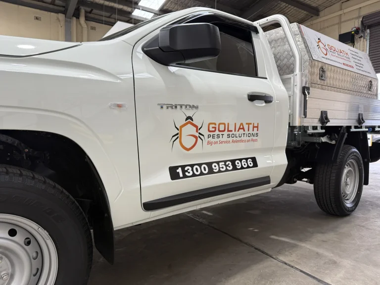 Goliath Pest Solutions service vehicle side view