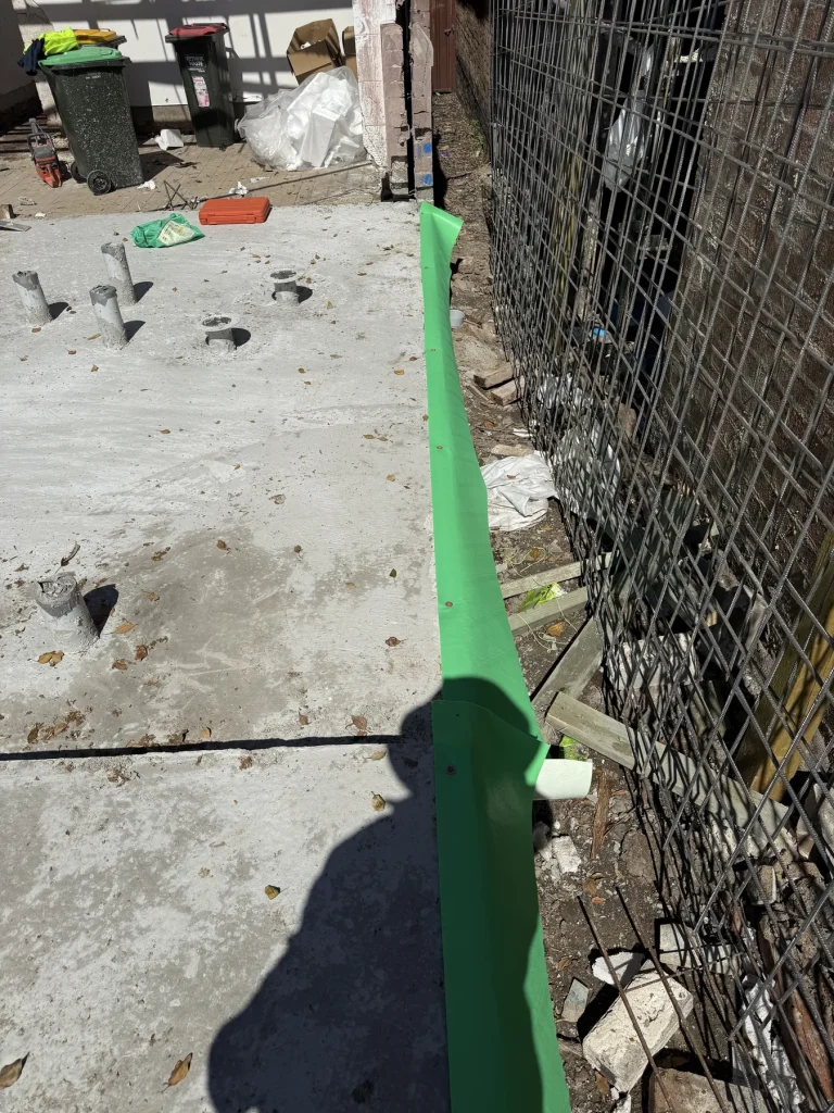 Termite barrier detail along a building construction edge