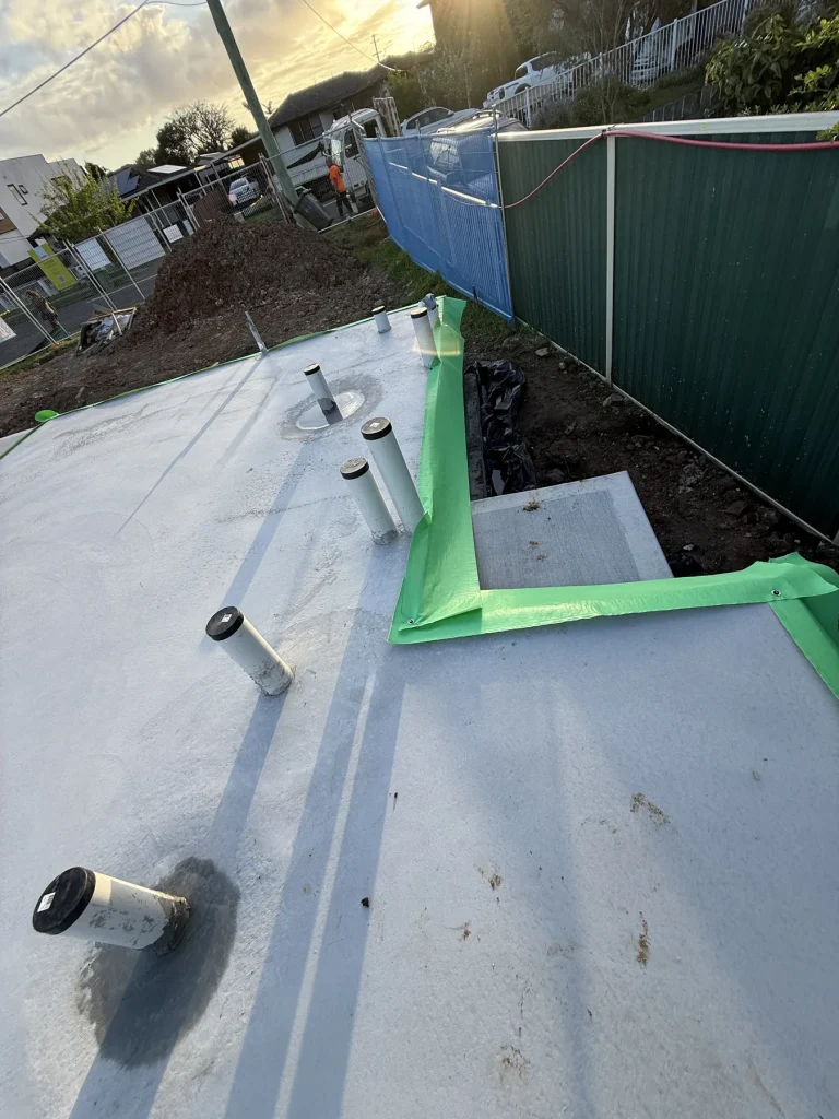 Physical termite protection installed along a concrete slab edge