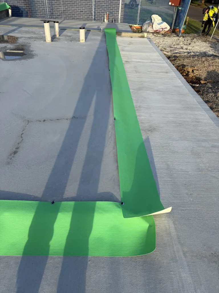 Physical termite barrier installed along a slab edge