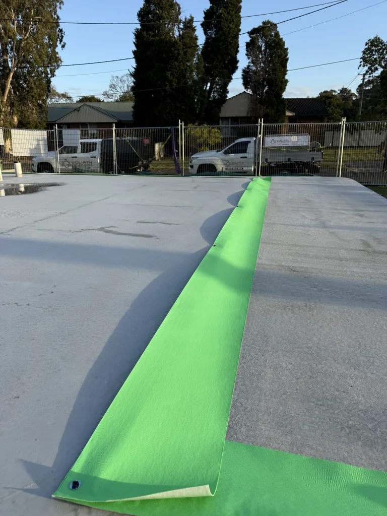 Termite protection installed along a concrete slab construction joint